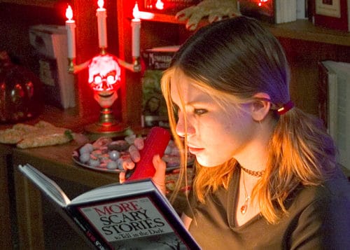 Picture-of-girl-reading-scary-stories