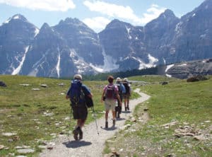 People-hiking-with-mountains-in-the-background