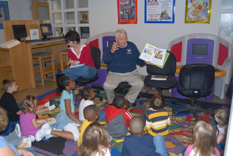 man-reading-to-children