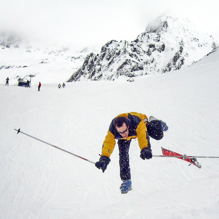 person-falling-down-on-skis