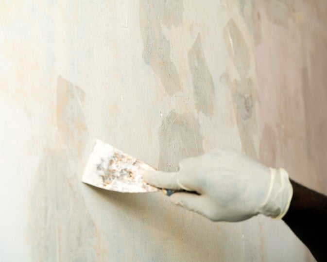hand-spackling-plaster-on-sheetrock-wall