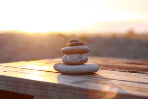 meditative-image-of-stones-and-sunset