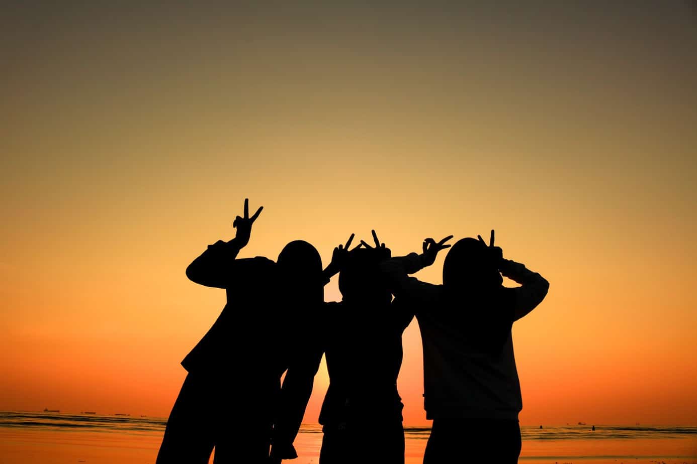 three-friends-at-sunset