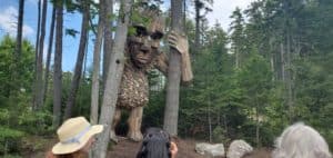 Wooden-troll-sculpture-in-the-woods