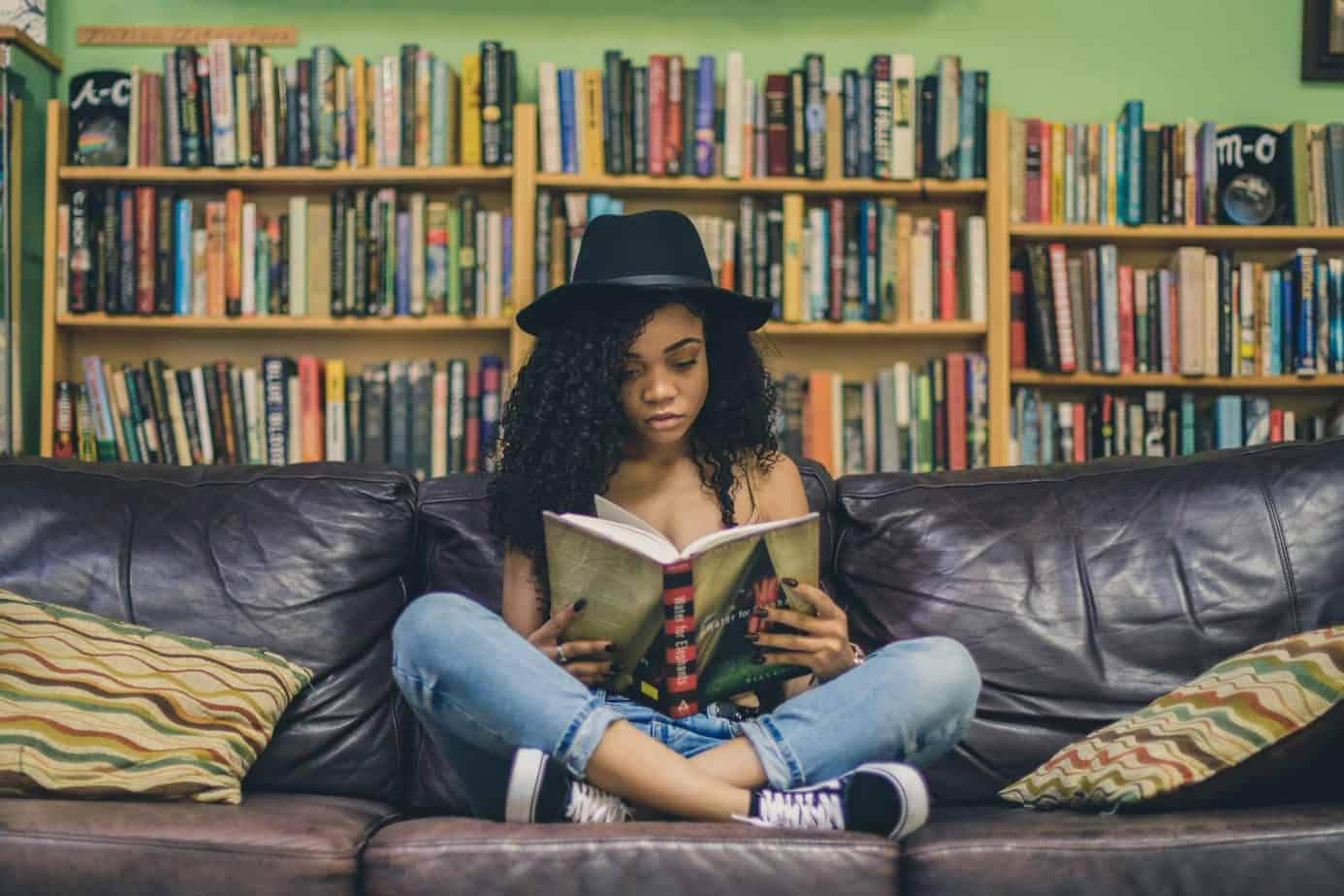 person-reading-on-sofa